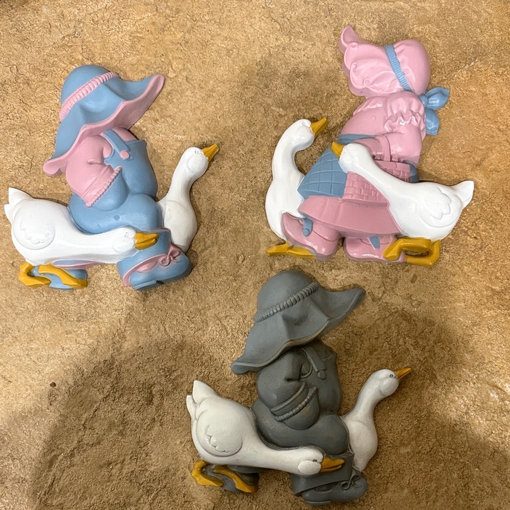 Set of Three Goose Figurines in Pink, Blue, and Gray